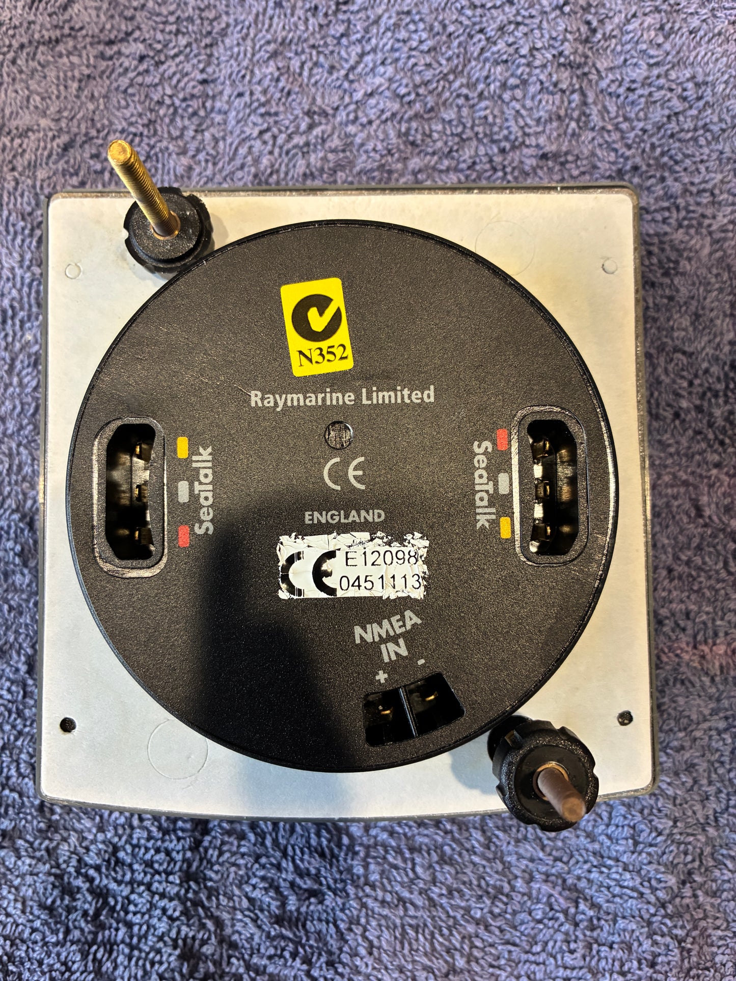 Raymarine ST6001 SmartPilot rear label showing part number E12098 and serial number 0451113