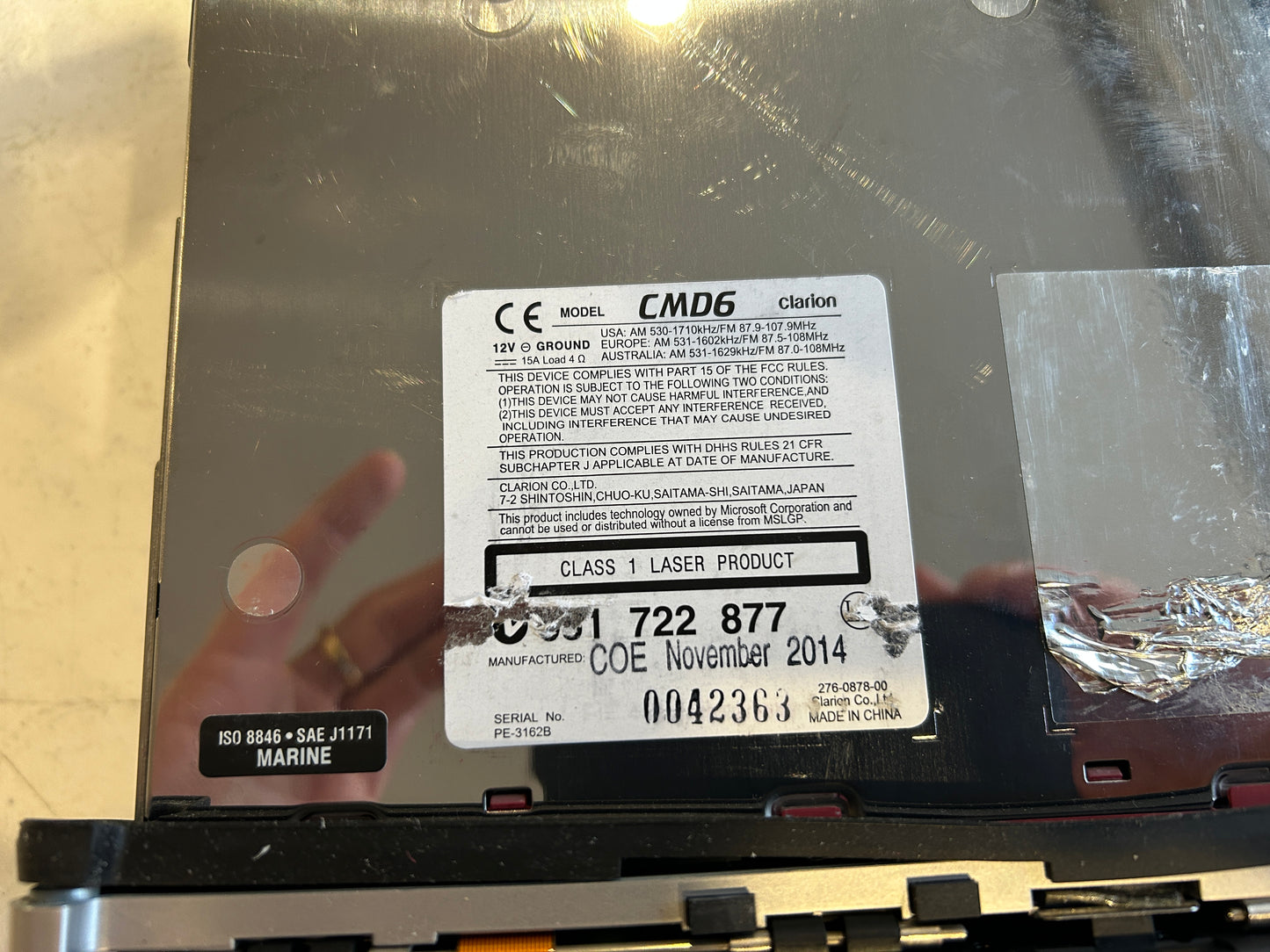 Clarion CMD6 marine receiver model label showing serial number 0042363