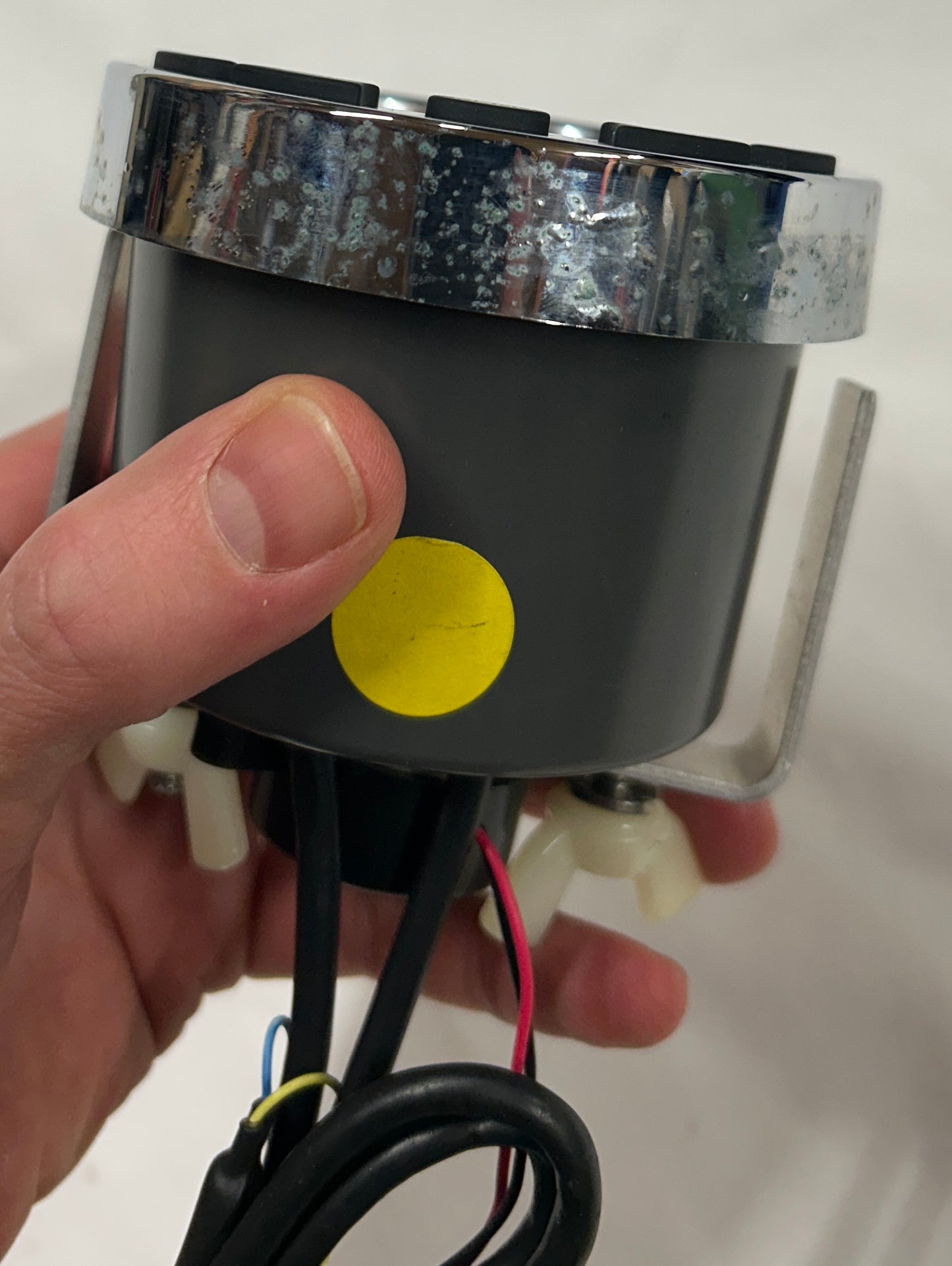 Evinrude I-Command gauge side view showing used cosmetic condition
