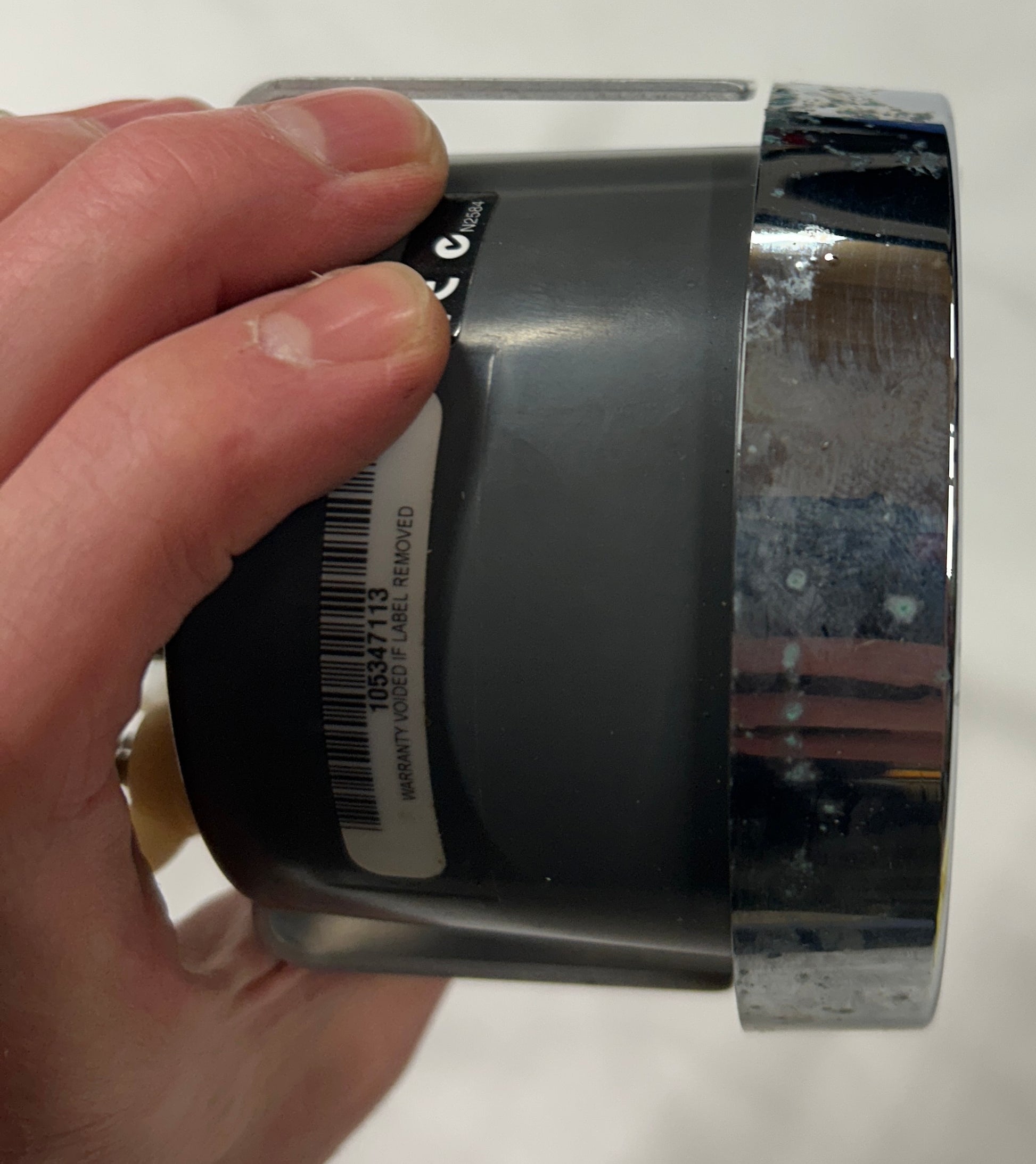 Evinrude I-Command gauge side view showing chrome bezel condition