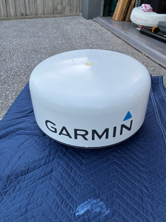 Garmin GMR 18 HD radome radar scanner front view with Garmin logo