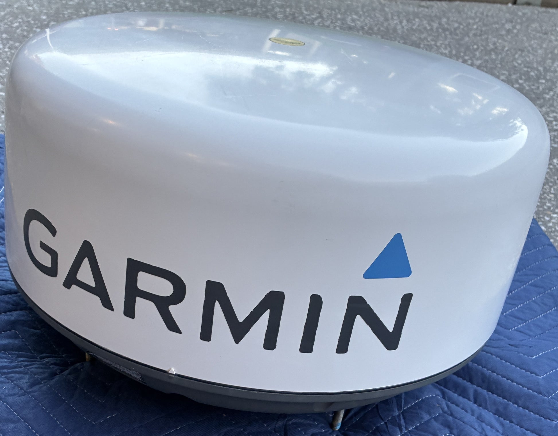 Garmin GMR 18 HD radome radar side view with Garmin logo and dome cover
