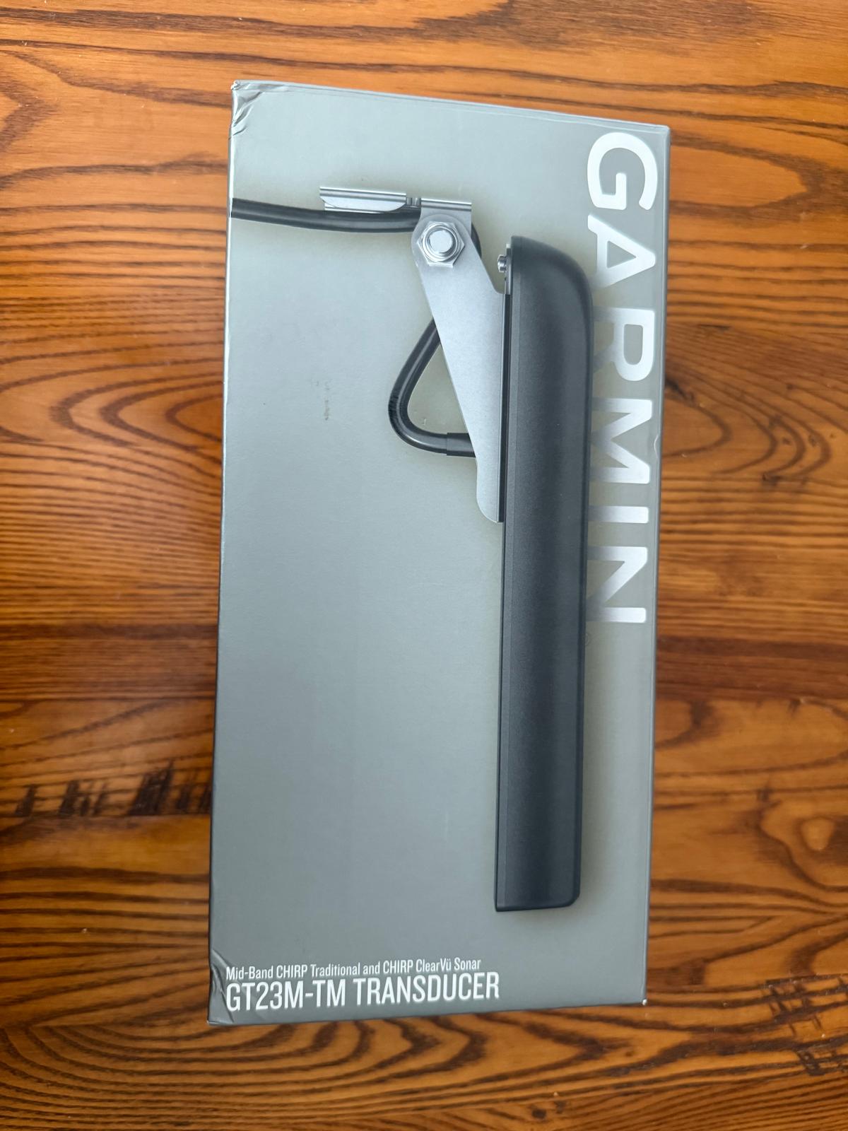 Garmin GT23M-TM transducer original box front showing mid-band CHIRP and ClearVu sonar