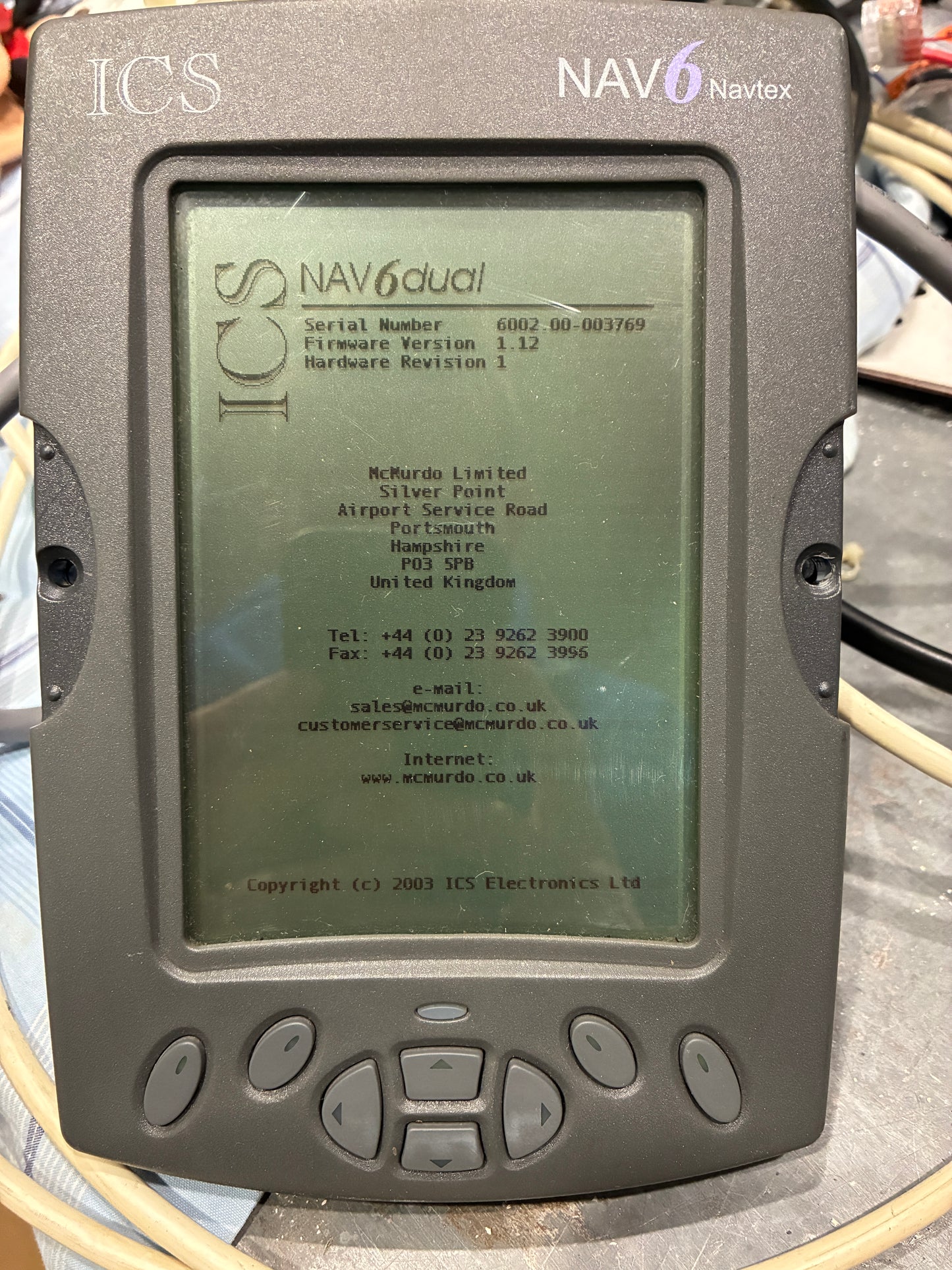 ICS NAV6dual NAVTEX display powered on showing serial number and firmware version