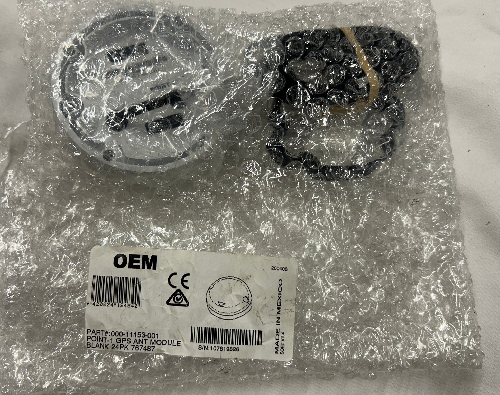 Navico Point-1 GPS antenna module packaging label showing part number 000-11153-001