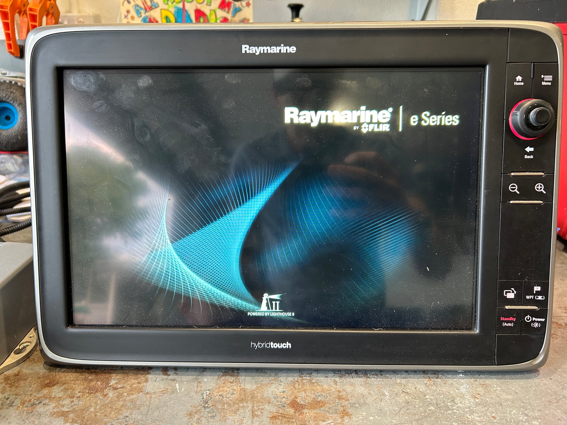 Raymarine e165 E70025 HybridTouch multifunction display showing LightHouse II startup screen