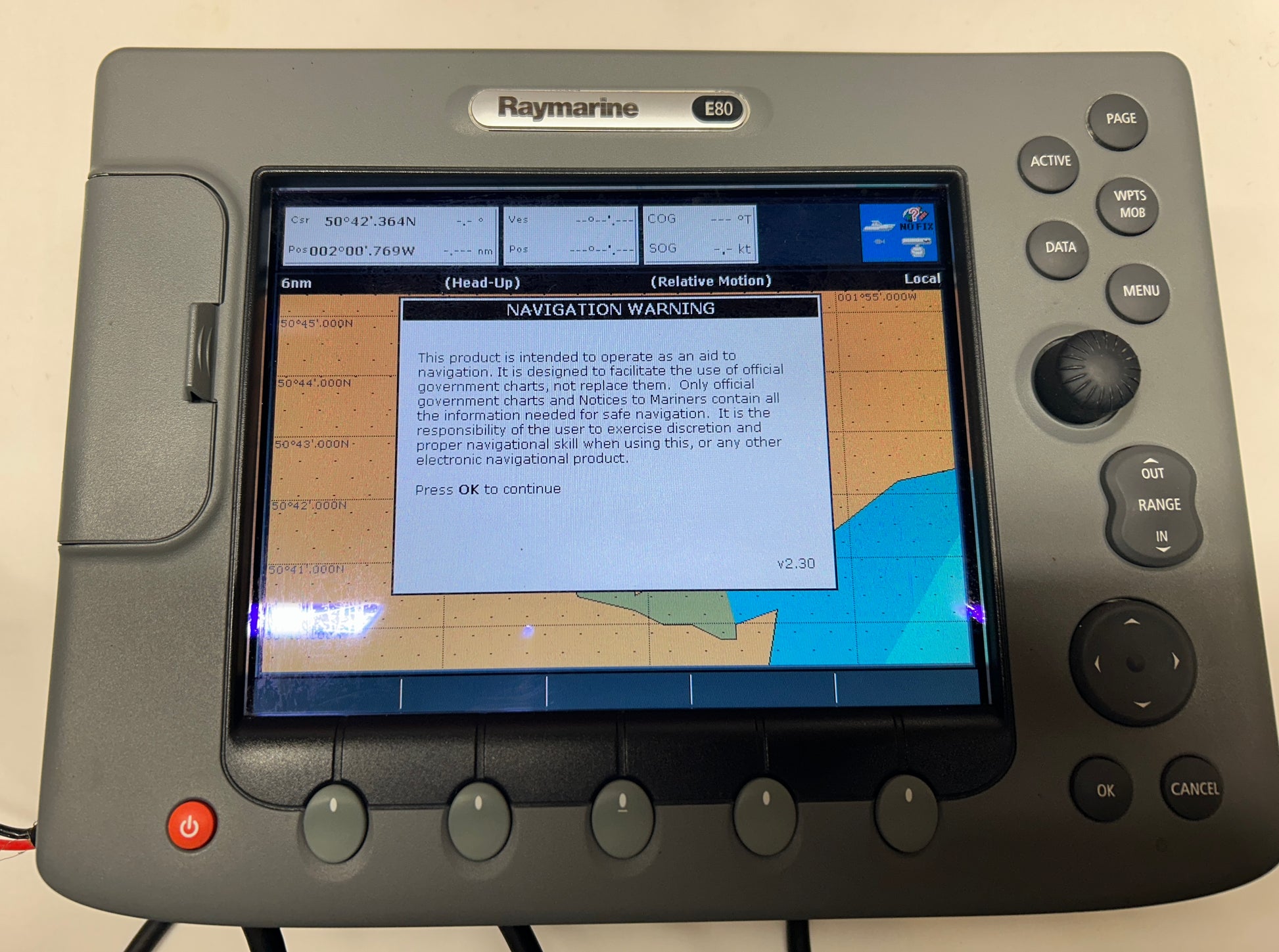 Raymarine E80 Classic MFD showing navigation warning screen