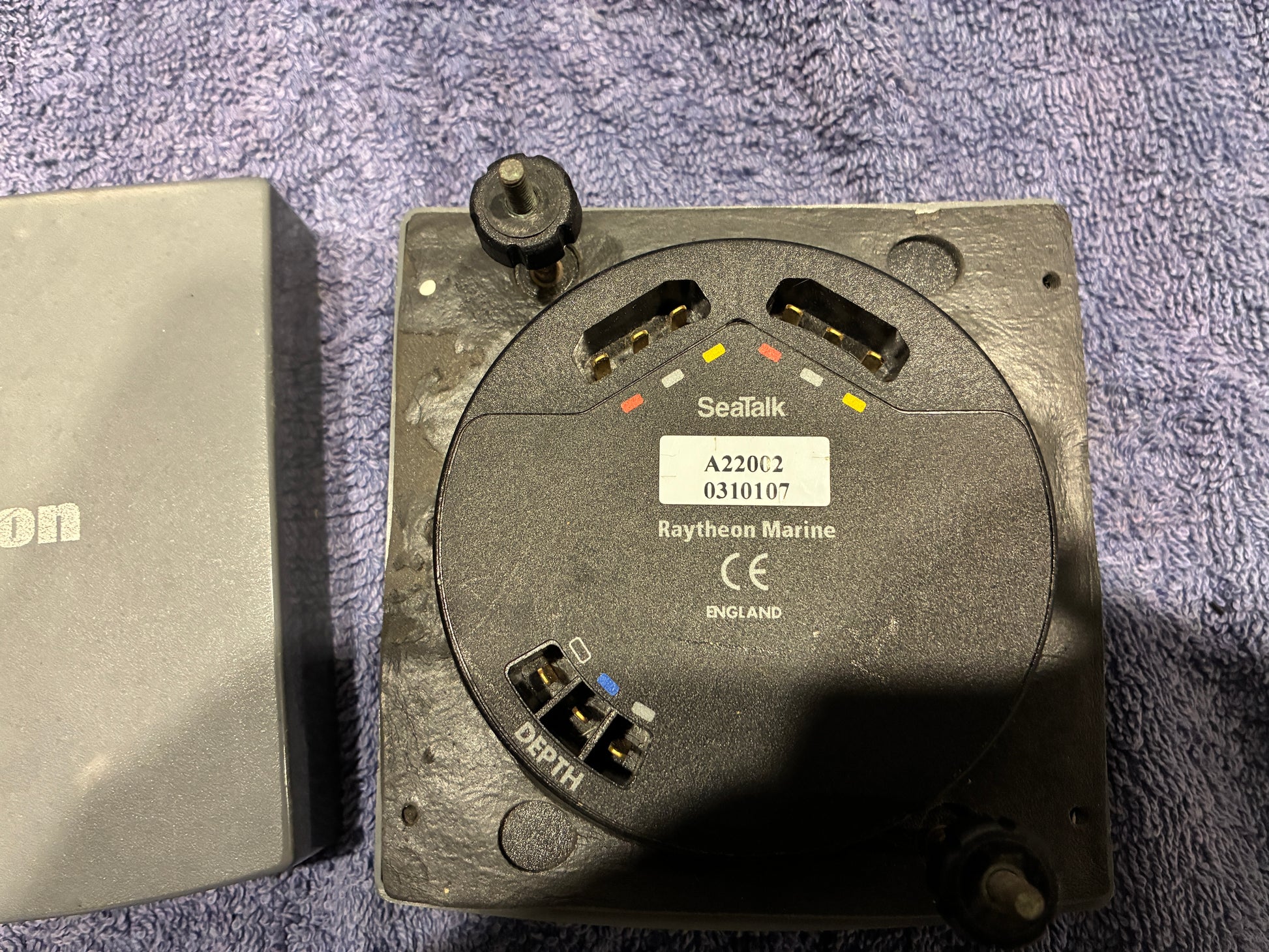 Raytheon Raymarine ST60 Depth rear label showing part number A22002 and serial number 0310107