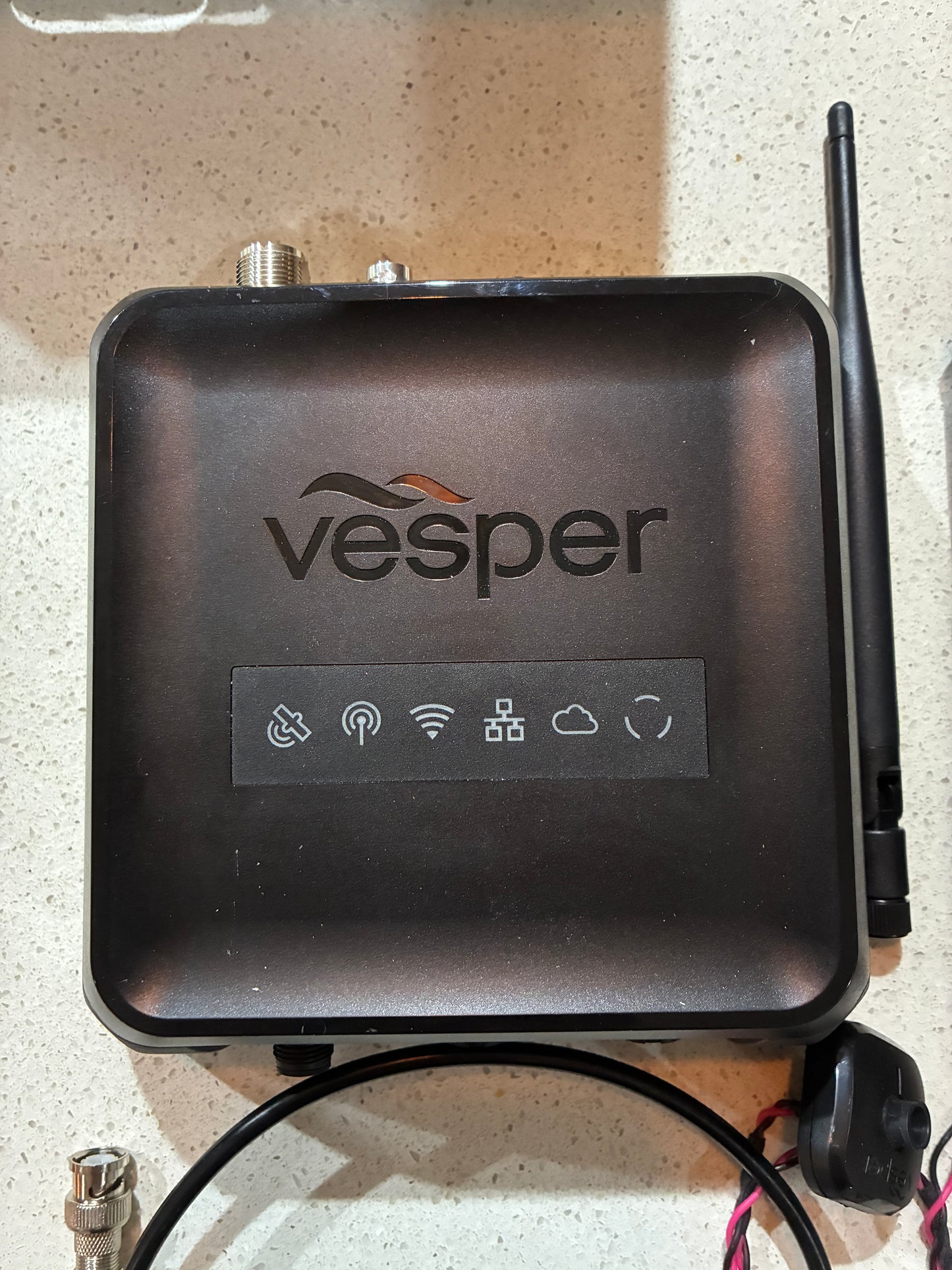 Vesper Cortex M1-GBL hub front with Vesper logo